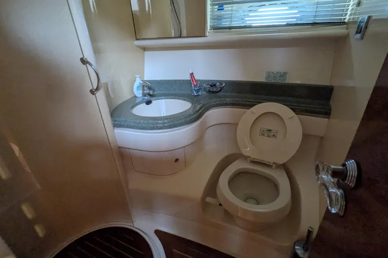  Yacht Photos Pics Bathroom interior of 2000 Azimut 46 yacht with sink and toilet.