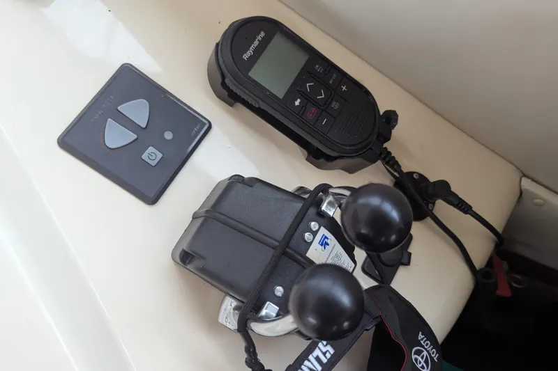  Yacht Photos Pics Azimut 46 yacht controls, featuring Raymarine device and throttle levers, 2000 model.