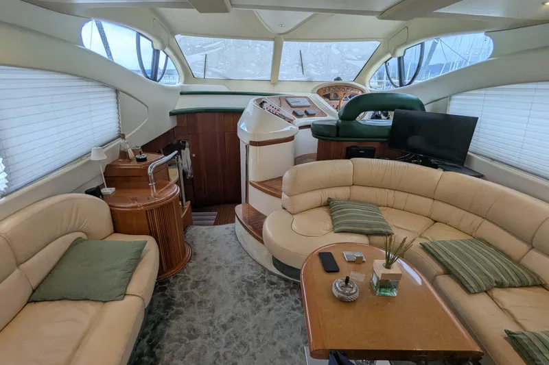 Yacht Photos Pics Luxurious interior of a 2000 Azimut 46 yacht with plush seating and modern amenities.