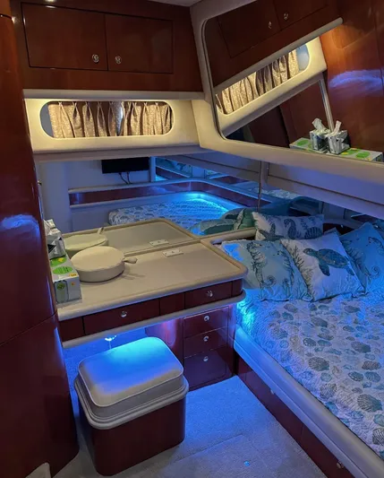  Yacht Photos Pics Luxurious cabin interior of a 2001 Sea Ray 560 Sedan Bridge yacht with ambient lighting.