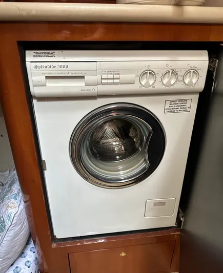  Yacht Photos Pics Compact washer-dryer unit in 2001 Sea Ray 560 Sedan Bridge yacht.