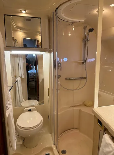  Yacht Photos Pics 2001 Sea Ray 560 Sedan Bridge bathroom with shower and toilet.