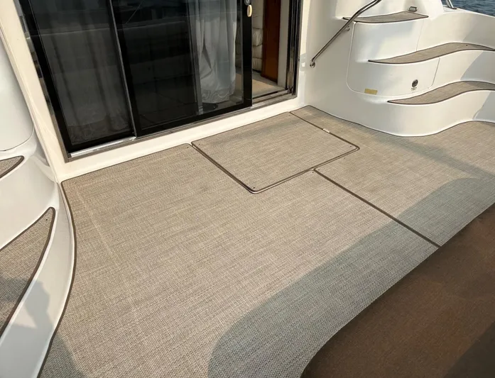  Yacht Photos Pics 2001 Sea Ray 560 Sedan Bridge deck with sliding glass door.