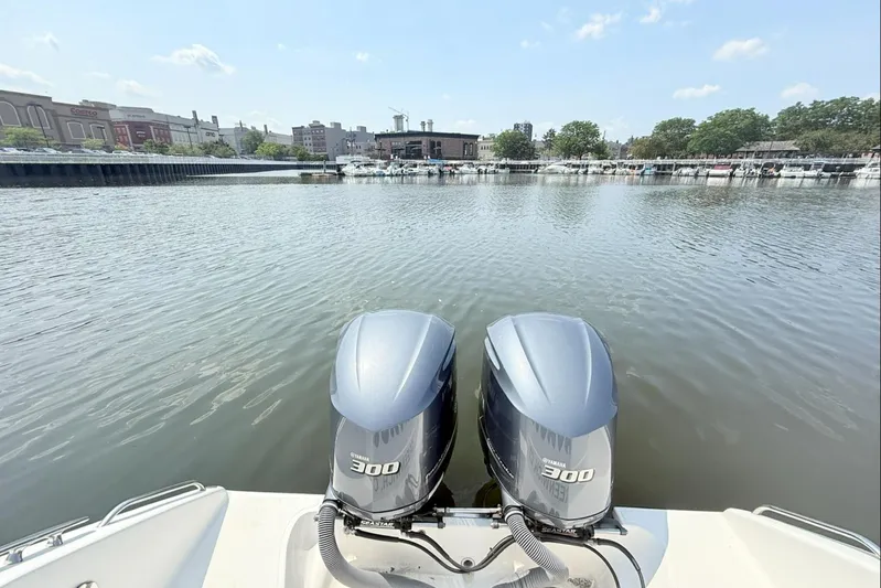 Savages Yacht Photos Pics Twin Yamaha 300 engines on a 2015 Pursuit ST 310 Sport boat, dockside view.