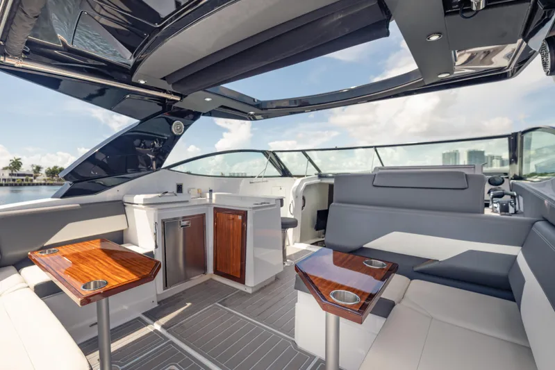  Yacht Photos Pics Luxurious interior of 2021 Cruisers Yachts 38 GLS with sleek seating and modern amenities.