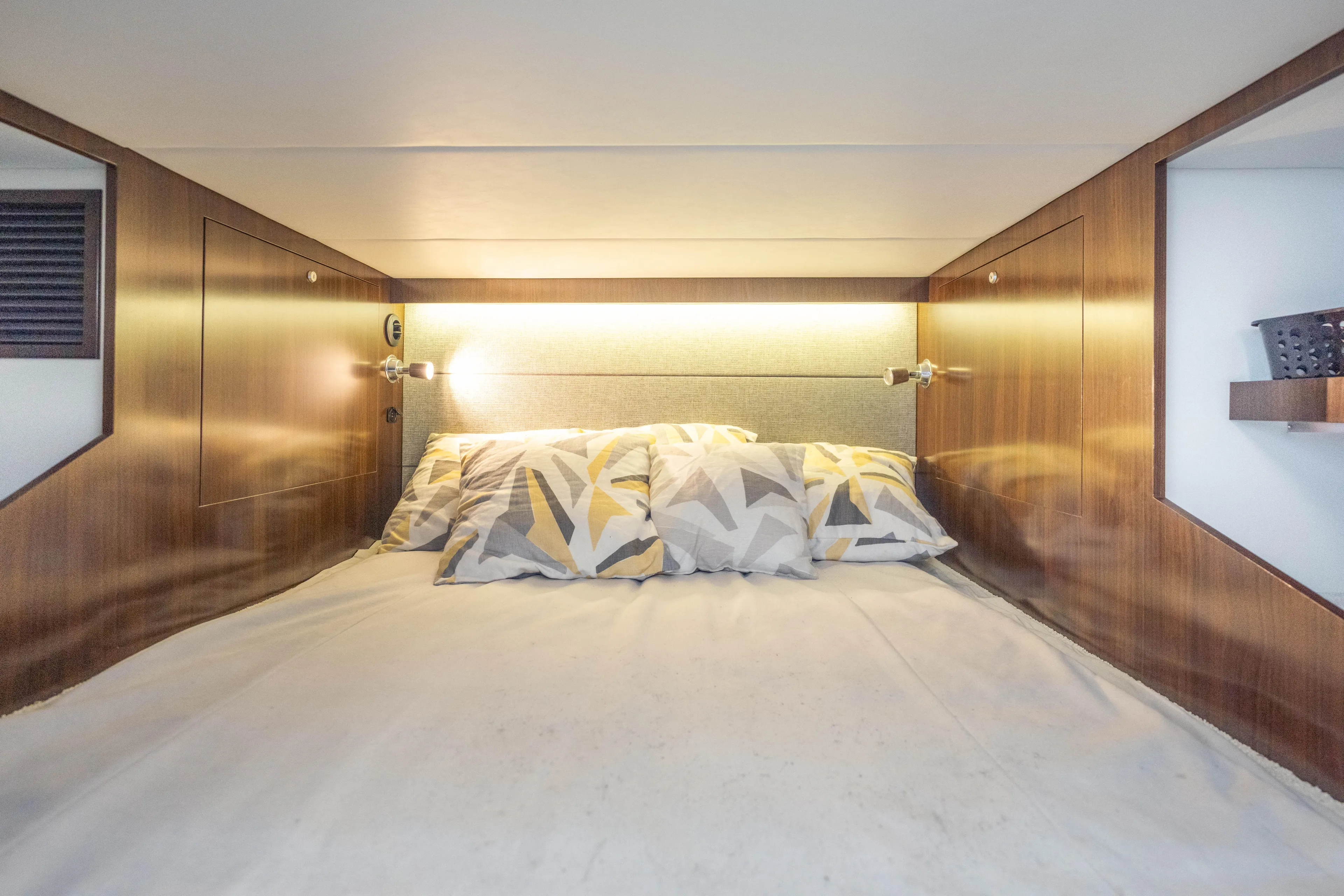  Yacht Photos Pics Luxurious cabin interior of 2021 Cruisers Yachts 38 GLS with modern bedding.