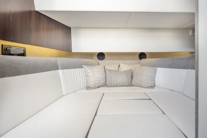  Yacht Photos Pics Interior cabin of 2021 Cruisers Yachts 38 GLS with modern seating and cushions.