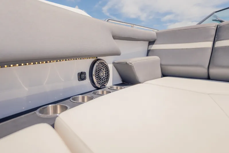  Yacht Photos Pics Luxurious seating area on 2021 Cruisers Yachts 38 GLS with cup holders and speaker.