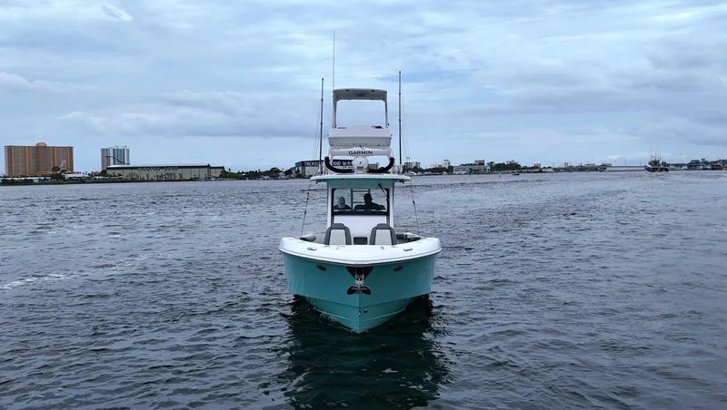 Engine Warranty Yacht Photos Pics 2023 Everglades 365 CC boat on open water under cloudy sky.