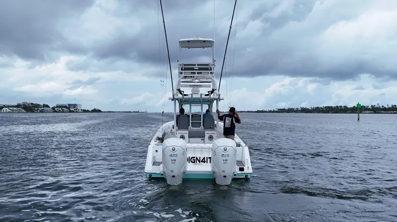 Engine Warranty Yacht Photos Pics 2023 Everglades 365 CC boat on water under cloudy sky.