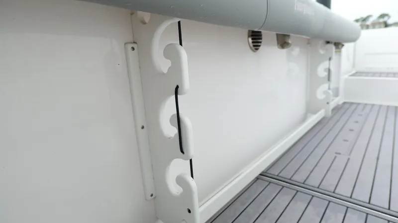 Engine Warranty Yacht Photos Pics 2023 Everglades 365 CC boat interior with rod holders and non-slip deck.