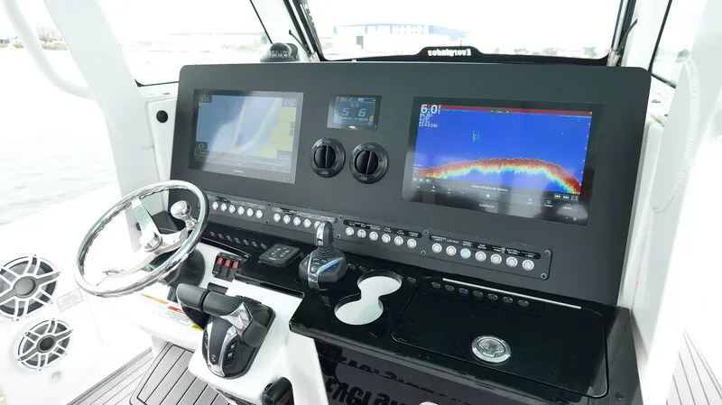 Engine Warranty Yacht Photos Pics Control panel of 2023 Everglades 365 CC boat with advanced navigation displays.