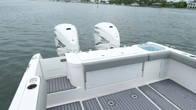 Engine Warranty Yacht Photos Pics 2023 Everglades 365 CC boat with twin Yamaha engines on calm water.