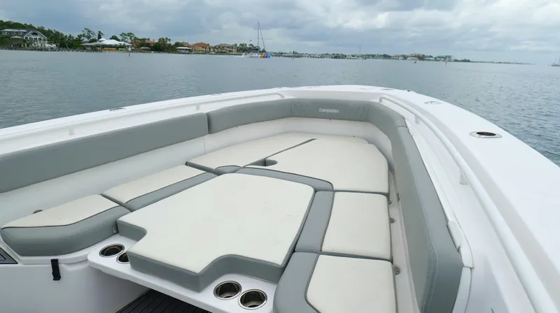 Engine Warranty Yacht Photos Pics 2023 Everglades 365 CC boat with spacious seating on calm water.