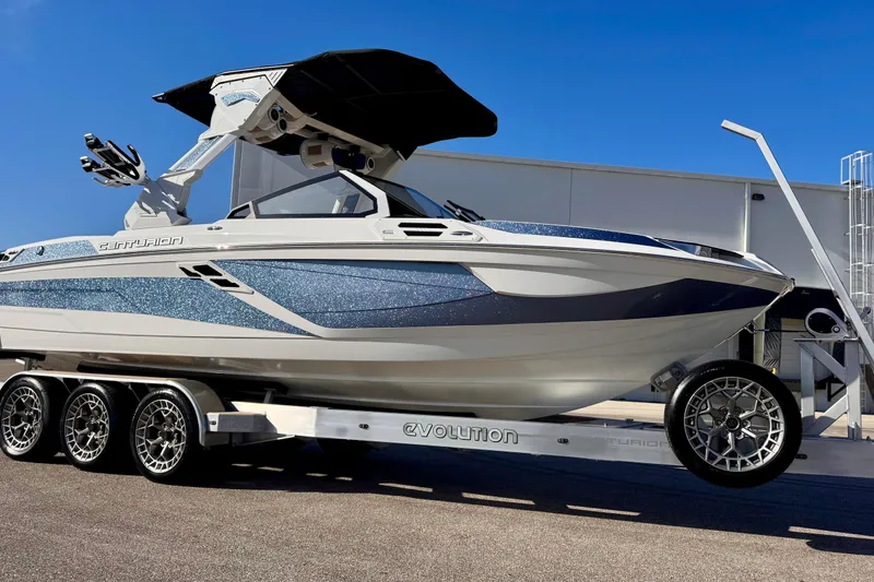  Yacht Photos Pics 2025 Centurion Ri245 boat on trailer, featuring sleek design and modern aesthetics.