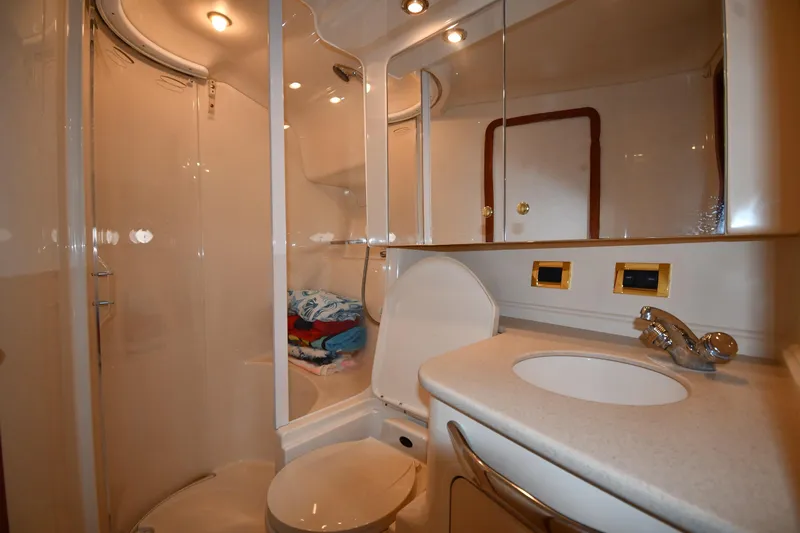  Yacht Photos Pics Luxurious bathroom in 2000 Sea Ray 460 Sundancer yacht with shower and vanity.