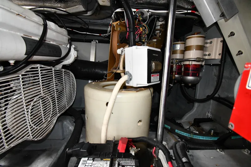  Yacht Photos Pics Engine room of a 2000 Sea Ray 460 Sundancer with mechanical components and wiring.