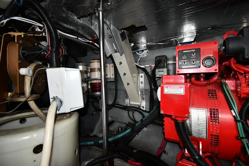  Yacht Photos Pics Engine room of a 2000 Sea Ray 460 Sundancer with generator and wiring.