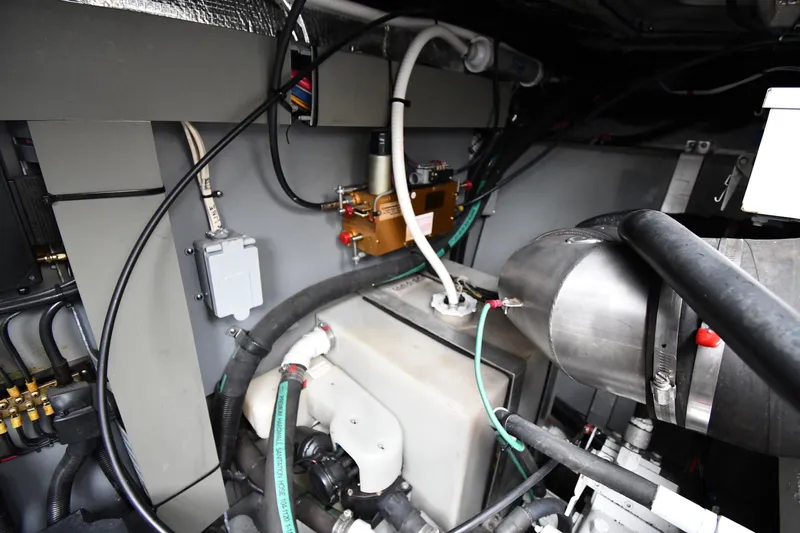  Yacht Photos Pics Engine room of a 2000 Sea Ray 460 Sundancer with visible wiring and components.