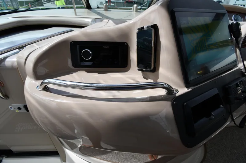  Yacht Photos Pics Control panel of a 2000 Sea Ray 460 Sundancer yacht with modern navigation equipment.