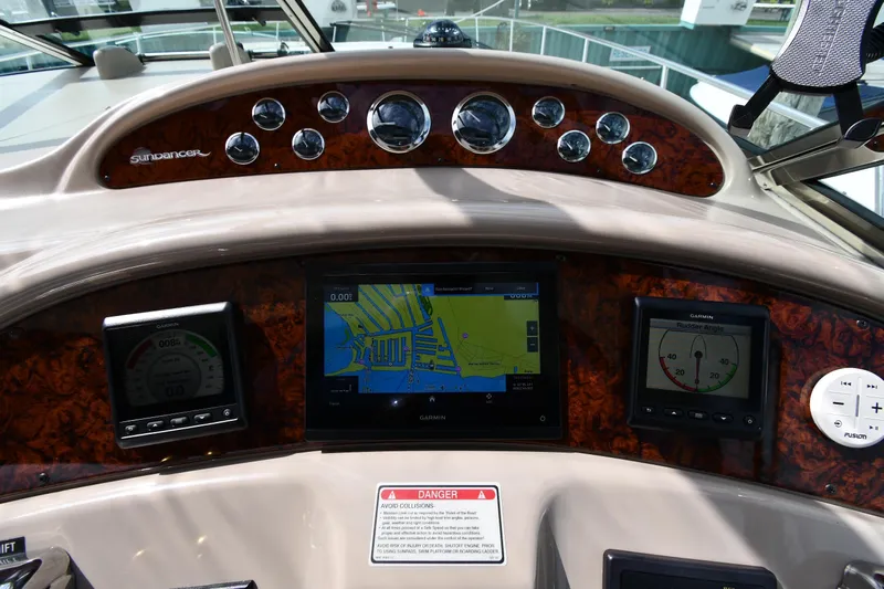  Yacht Photos Pics Dashboard of a 2000 Sea Ray 460 Sundancer with navigation and control instruments.