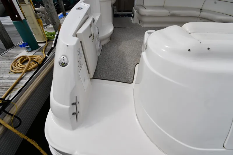  Yacht Photos Pics 2000 Sea Ray 460 Sundancer yacht deck with seating and dockside view.