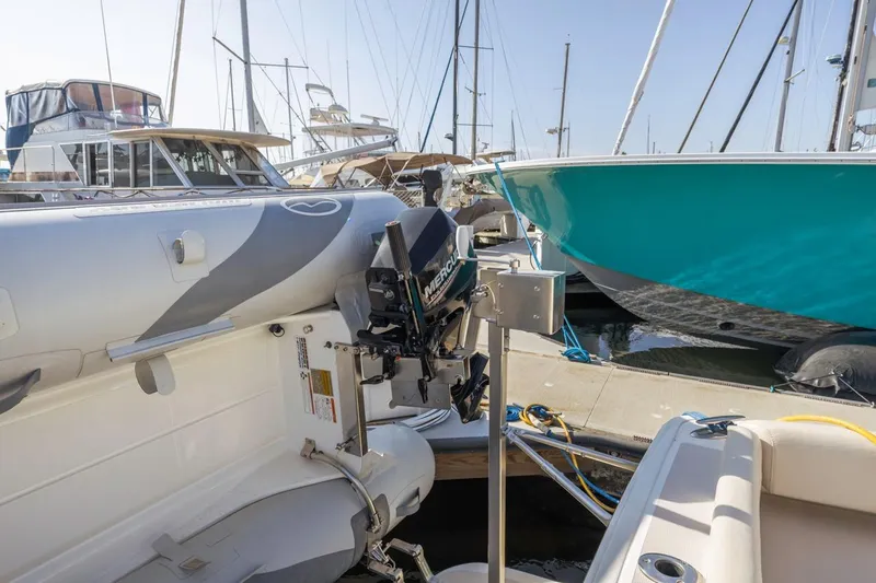 Kaholo Yacht Photos Pics 2008 Back Cove 33 yacht docked with inflatable boat and outboard motor.