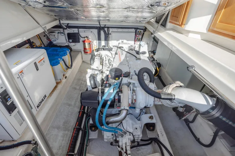 Kaholo Yacht Photos Pics Engine room of 2008 Back Cove 33 boat with Cummins engine and Kohler generator.