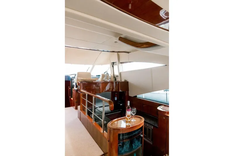 M/y Oneiro Yacht Photos Pics Luxurious interior of 2008 Fairline 58 yacht with elegant wood finishes.