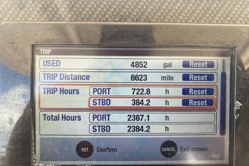  Yacht Photos Pics Display screen showing trip data for a 2018 Grady-White Canyon 306 boat.