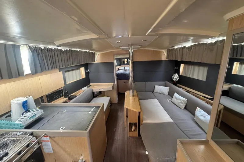 Bambino Yacht Photos Pics Interior of 2019 Beneteau Oceanis 41.1 yacht, featuring modern design and comfortable seating.