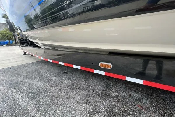  Yacht Photos Pics 2019 Nor-Tech 450 Sport Center Console boat on a trailer, side view.