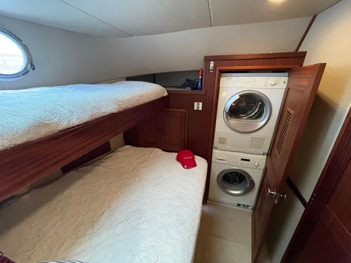 Pacific Rose Yacht Photos Pics Cozy cabin with bunk beds and laundry in 2009 American Tug 49 Limited.