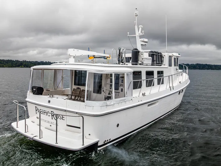 Pacific Rose Yacht Photos Pics 2009 American Tug 49 Limited cruising on a cloudy day.