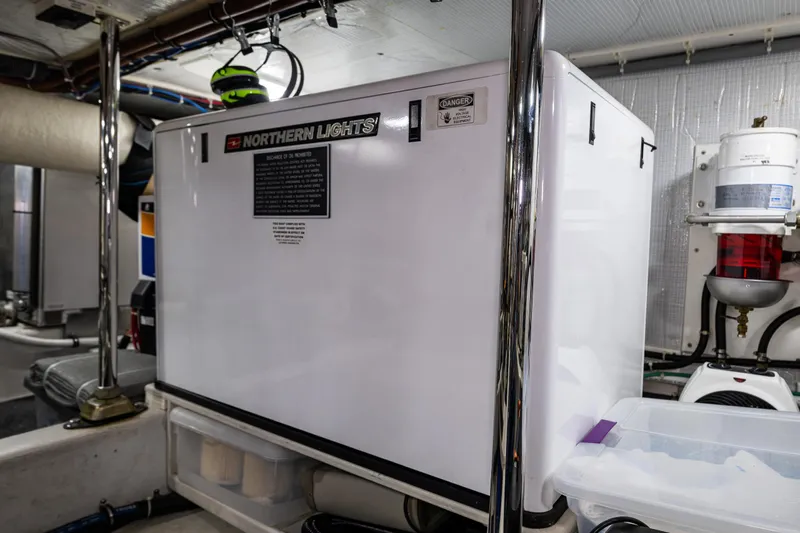 Pacific Rose Yacht Photos Pics Engine room of 2009 American Tug 49 Limited with Northern Lights generator.