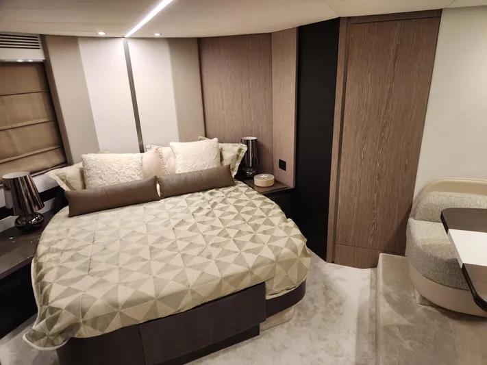 Pri Sea Yacht Photos Pics Luxurious bedroom interior of 2019 Azimut S6 yacht with modern design and elegant furnishings.