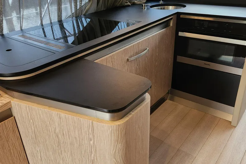 Pri Sea Yacht Photos Pics Modern kitchen interior of 2019 Azimut S6 yacht with sleek countertops and appliances.