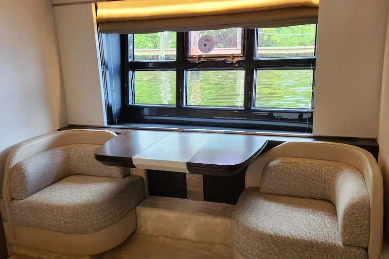 Pri Sea Yacht Photos Pics Luxurious interior of 2019 Azimut S6 yacht with elegant seating and window view.