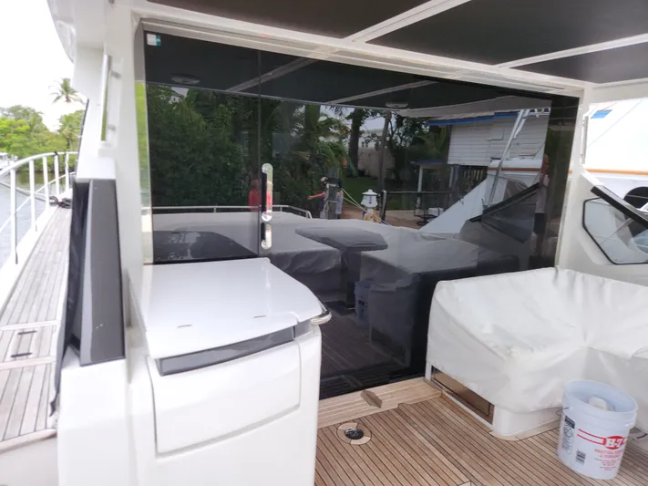 Pri Sea Yacht Photos Pics 2019 Azimut S6 yacht deck with covered seating and sleek design.