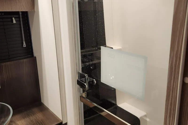 Pri Sea Yacht Photos Pics Interior of 2019 Azimut S6 yacht featuring a modern bathroom with glass shower door.