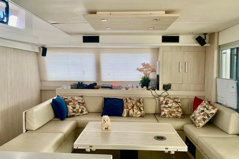  Yacht Photos Pics Luxurious 2018 Leopard 58 yacht interior with cozy seating and decorative pillows.