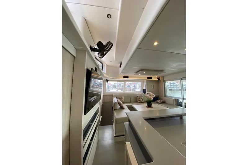  Yacht Photos Pics Luxurious interior of 2018 Leopard 58 yacht with modern seating and decor.