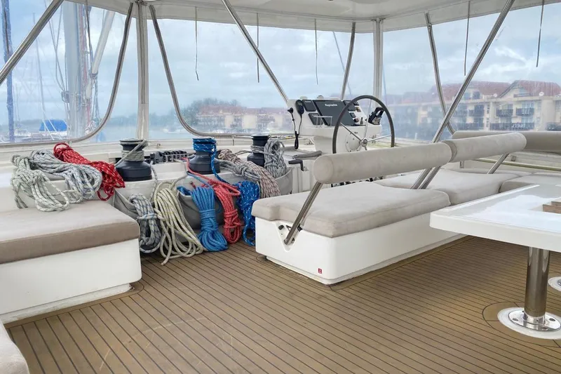  Yacht Photos Pics Luxurious 2018 Leopard 58 yacht interior with helm, seating, and ropes.