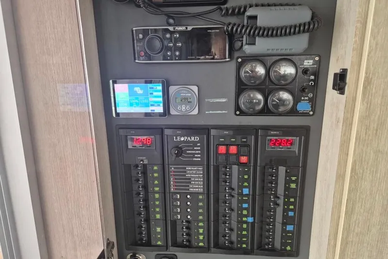  Yacht Photos Pics Electrical control panel of a 2018 Leopard 58 yacht with various gauges and displays.