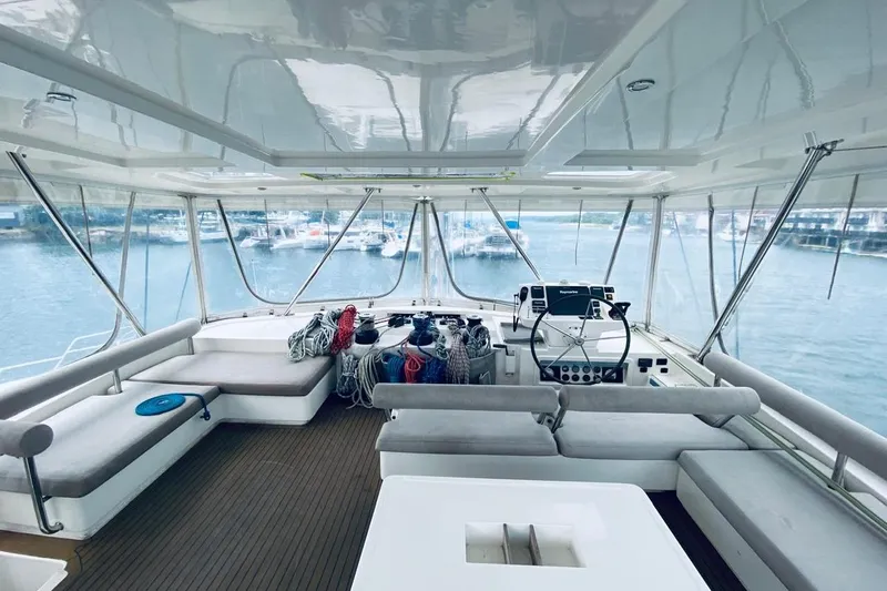  Yacht Photos Pics Luxurious 2018 Leopard 58 yacht interior with spacious seating and modern navigation equipment.