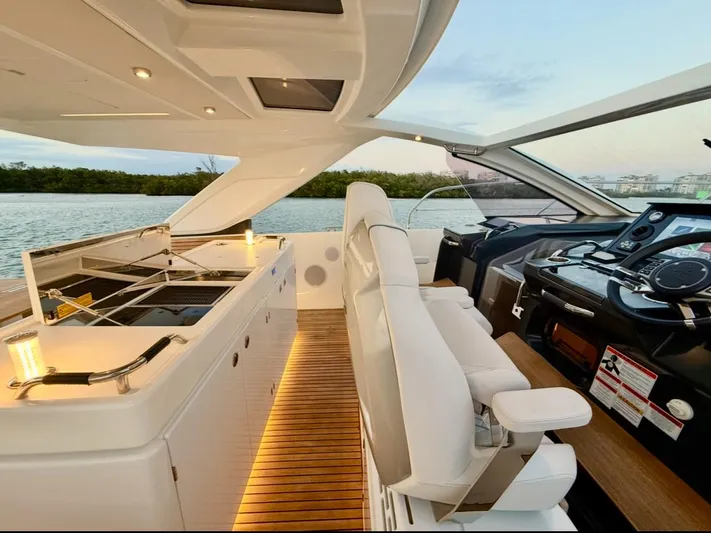  Yacht Photos Pics 2024 Jeanneau DB/43 OB yacht interior with sleek helm and modern amenities.