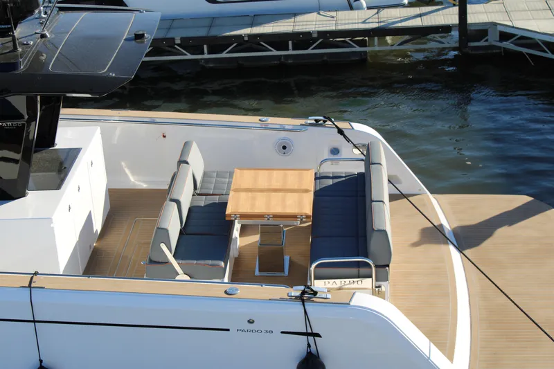  Yacht Photos Pics Luxury Pardo Yachts 38, 2025 model, featuring elegant deck seating and table.