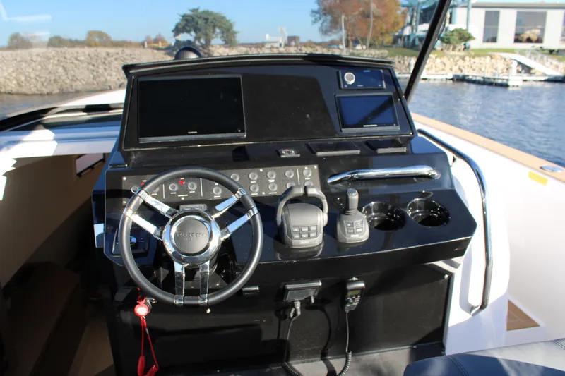  Yacht Photos Pics Helm of 2025 Pardo Yachts 38 with modern controls and navigation screens.