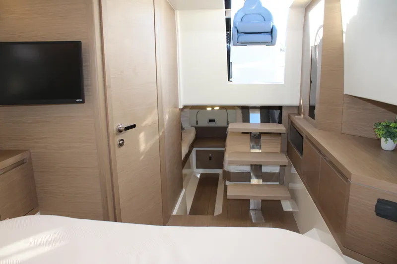  Yacht Photos Pics Luxurious interior of 2025 Pardo Yachts 38, featuring modern wood finishes and sleek design.