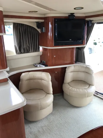 Yacht Photos Pics Interior of 2003 Sea Ray 480 Sedan Bridge with leather chairs.